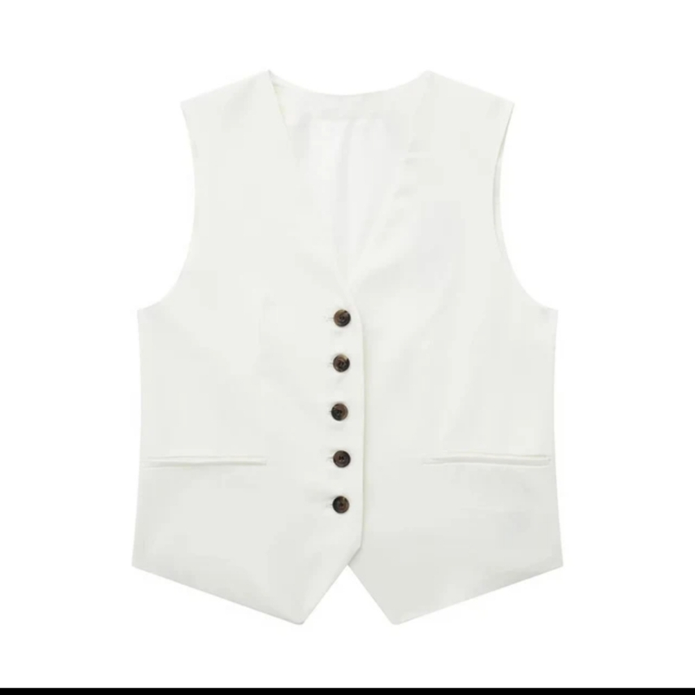 White vest with brown buttons. Brand new never worn in excellent condition